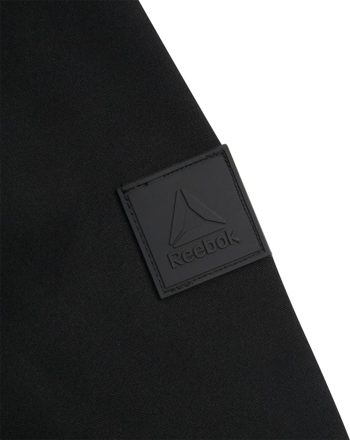 Reebok Women's Stretch Knit & Quilted Insulated Woven Jacket