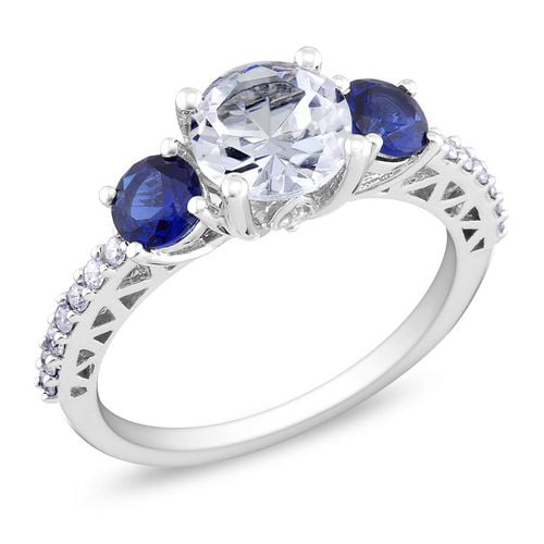 Bague Tangelo à trois pierres avec 2 carat de saphir blanc et bleu synthétique et 0.14 carat de diamants en or blanc 10k