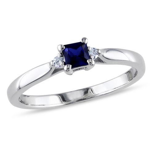 Bague de promesse Tangelo avec 0.33 carat de saphir bleu synthétique coupe princesse et accent de diamants en argent sterling