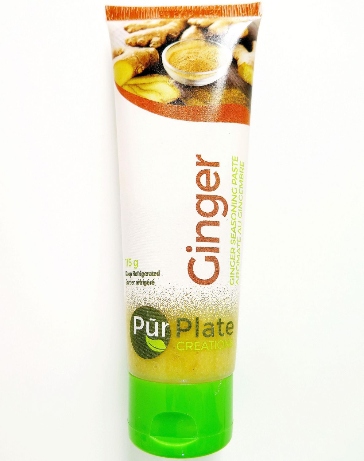 Pâte d'Assaisonnement au Gingembre, Contenant de 4 oz de Pâte de Gingembre Étiqueté à l'Avant avec Texte d'Étiquette Référençant « Freshness Guaranteed" »; Convient pour une Utilisation comme base de Sauté Rapide, Pâte de Cuisson Ou pour marinades et sauces.