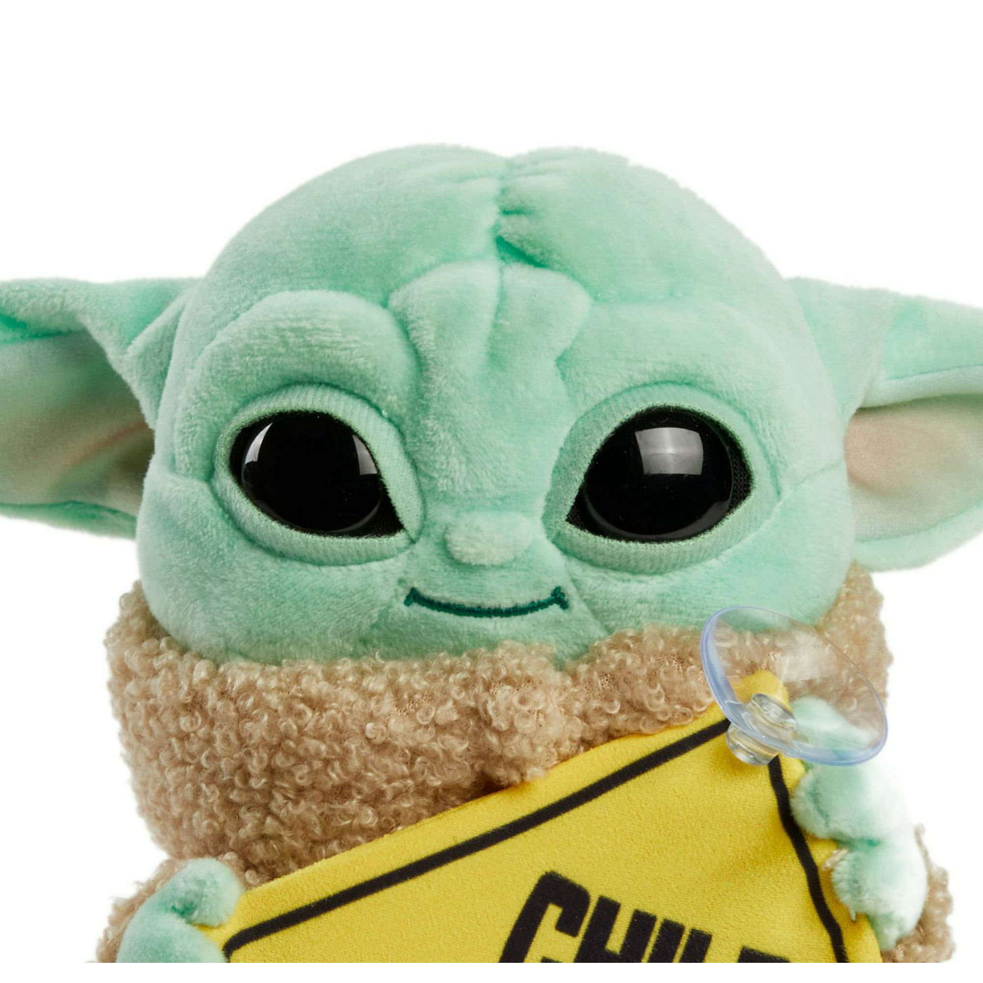 Premium Photo  A close up of a baby yoda with a hood and large blue eyes.