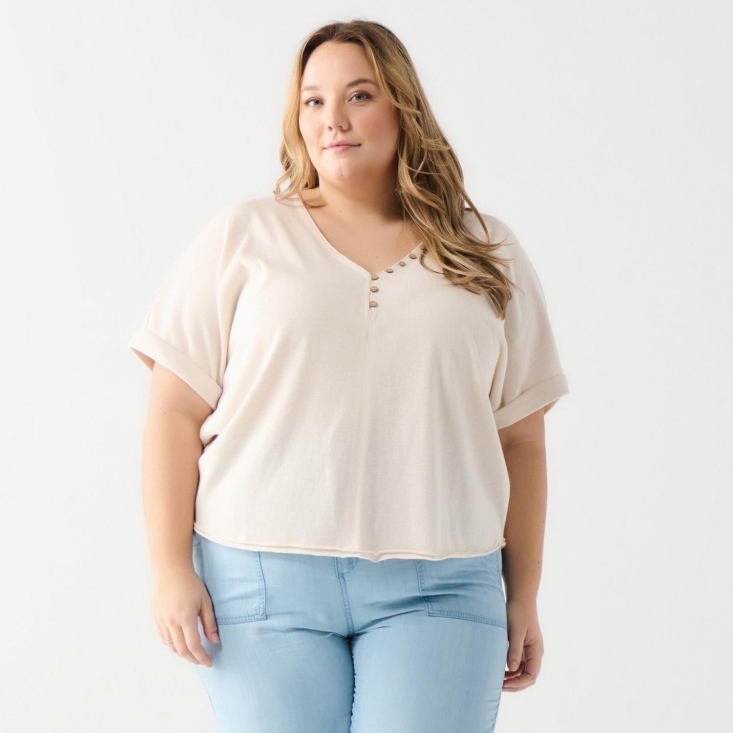 DV A loose fitting, rolled cuff S/S shirt with button up front