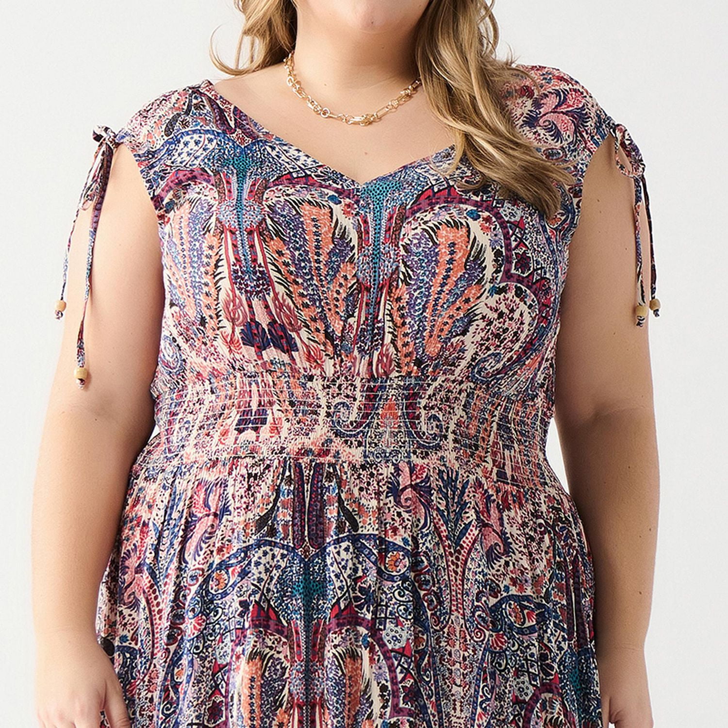 DV Sleeveless floral maxi dress with V-neck and a tiered ruffled hem