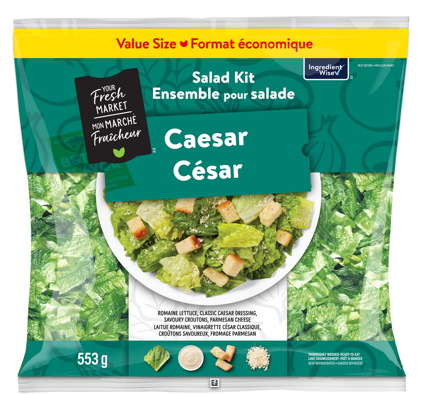 Your Fresh Market Value Size Caesar Salad Kit, 553 g. Extra-large clear clamshell with prewashed romaine lettuce, separate cup of classic Caesar dressing, shredded Parmesan and crunchy croutons; refrigerated label and nutrition panel visible. Often used as a quick side for weeknight meals or packed for picnics.