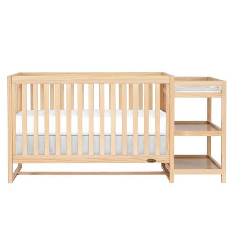 cot bed and changing table