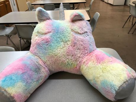 Pastel unicorn shop lounge pillow