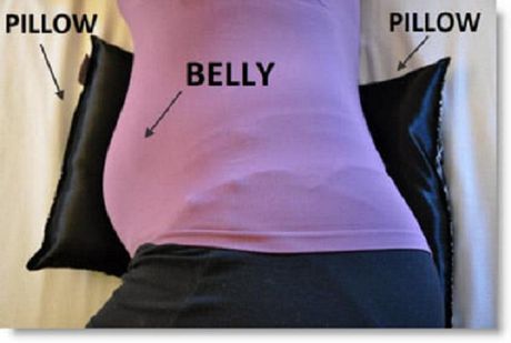 pillow under belly
